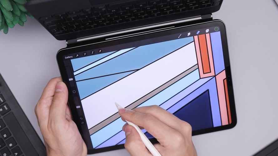 Somebody using an iPad Pro with stylus