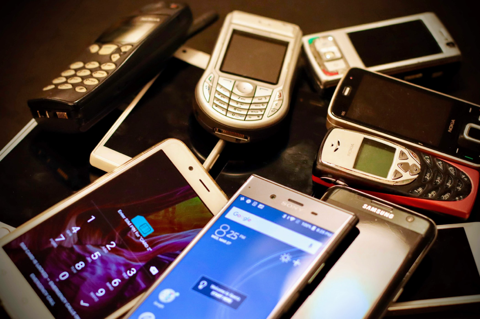 a selection of old mobile phone devices